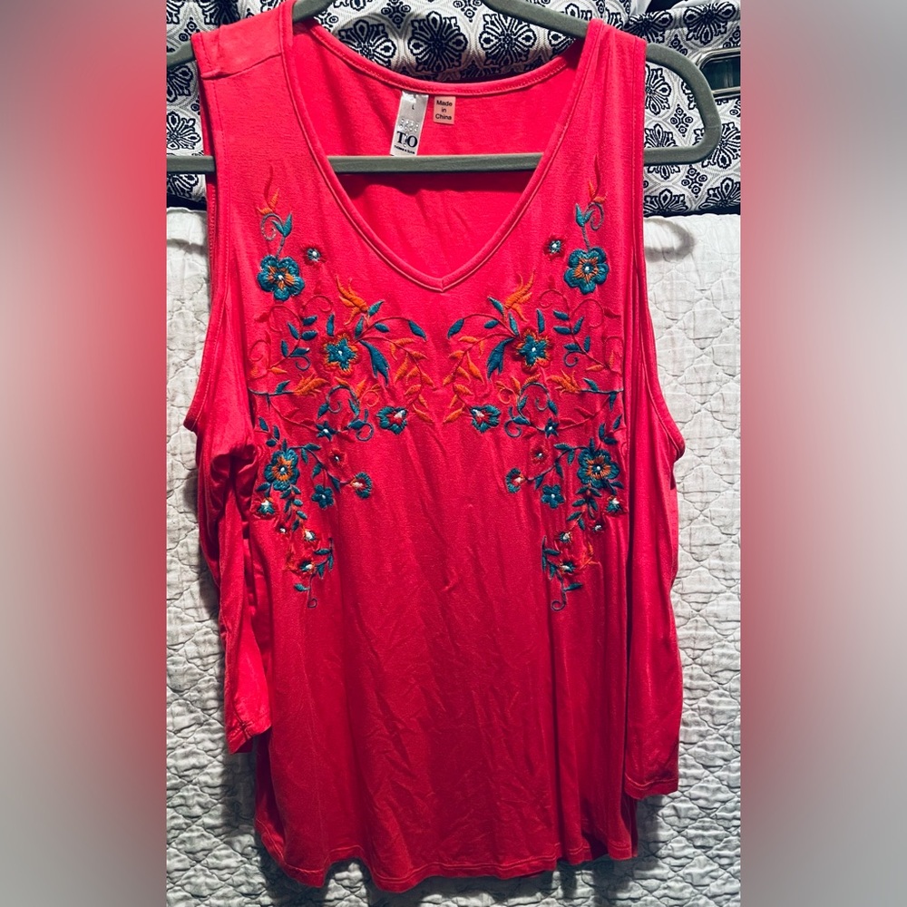 Vibrant Sleeveless Top with Floral Embroidery